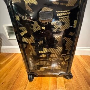 Tumi camouflage hard side, carry-on bag